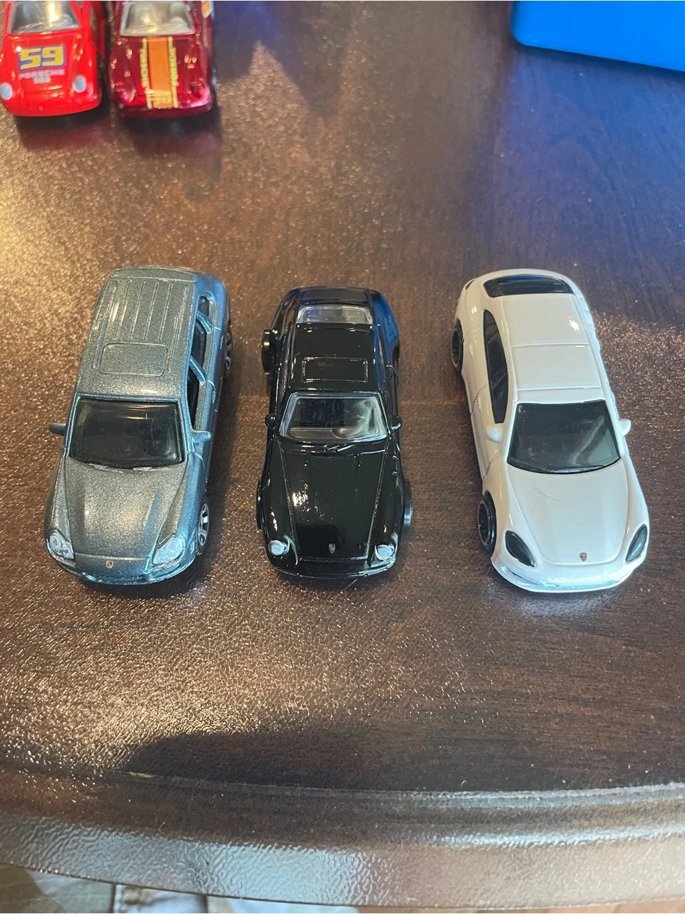 Set a five 1/64 scale diecast cars Porsche